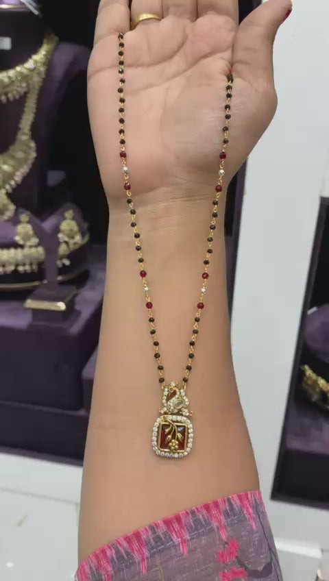 Elegant Black Bead Mangalsutra with Ruby Accent Pendant